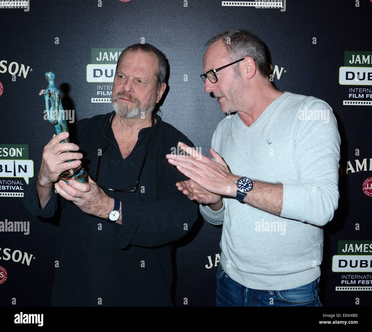 Director Terry Gilliam is presented with a Jameson Dublin International Film Festival Volta Award by Liam Cunningham at The Merrion Hotel before a screening of his movie The Zero Theorem...  Featuring: Terry Gilliam,Liam Cunningham Where: Dublin, Ireland Stock Photo