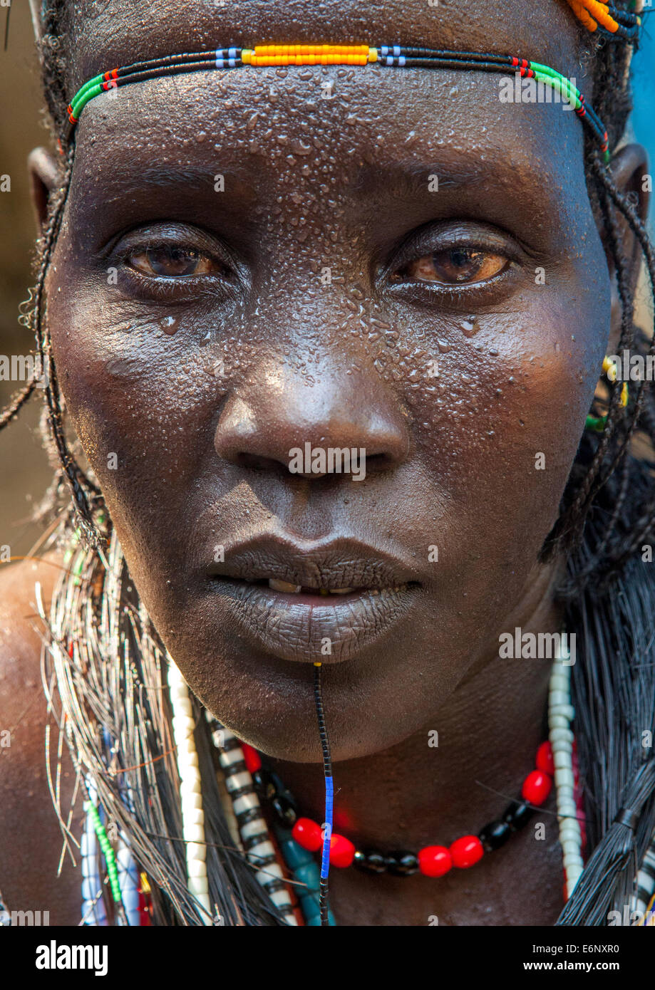 Woman From Anuak Tribe In Traditional Clothing, Gambela, Ethiopia Stock ...