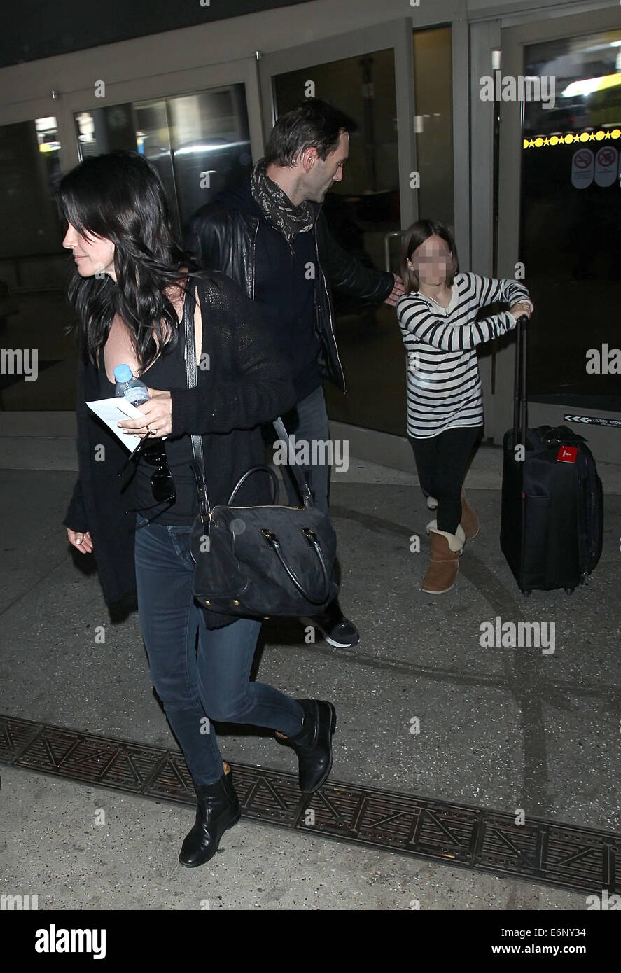 Courteney Cox arrives at Los Angeles International Airport with her