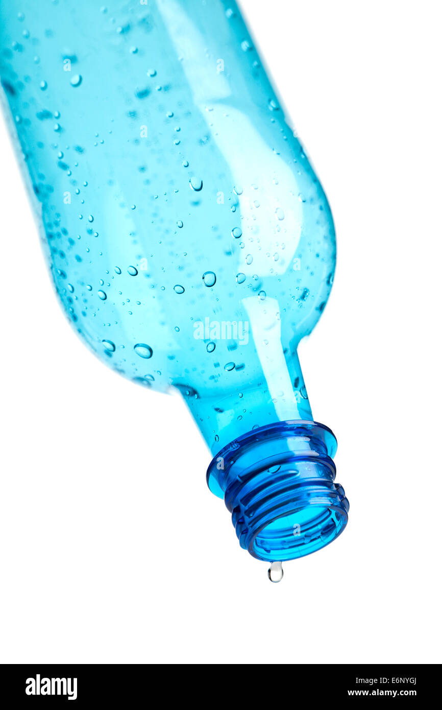 last drop dripping from blue water bottle, isolated on white background