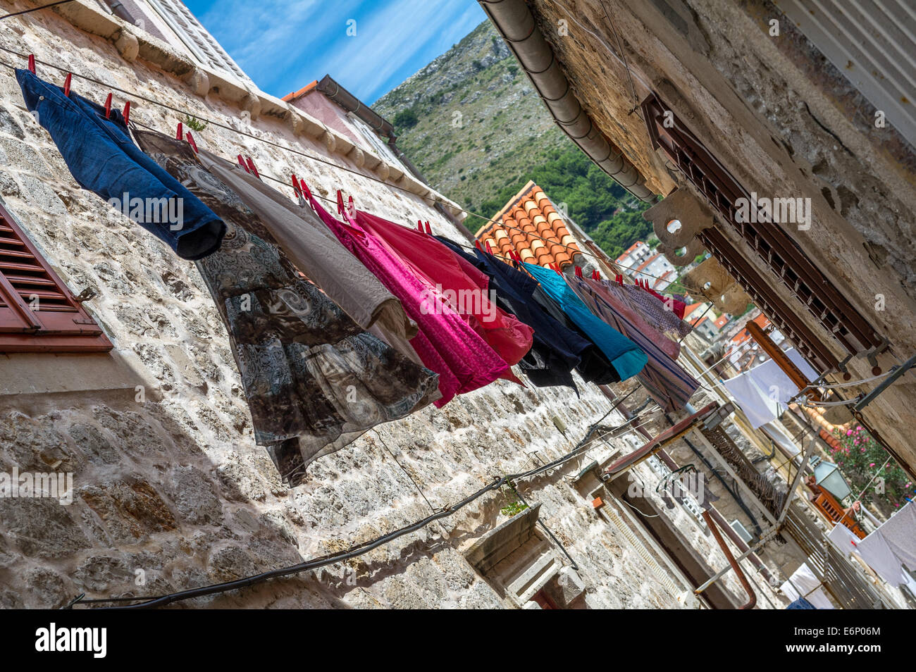 Washing hanging to dry in a side street in the old town of Dubrovnik. Stock Photo