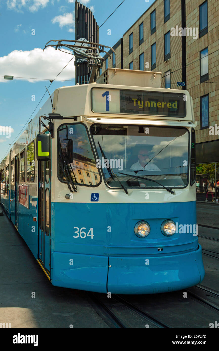 A blue tram running in the city center of Göteborg, Kungstorget, Bohuslän, Västergötland, Sweden. Stock Photo