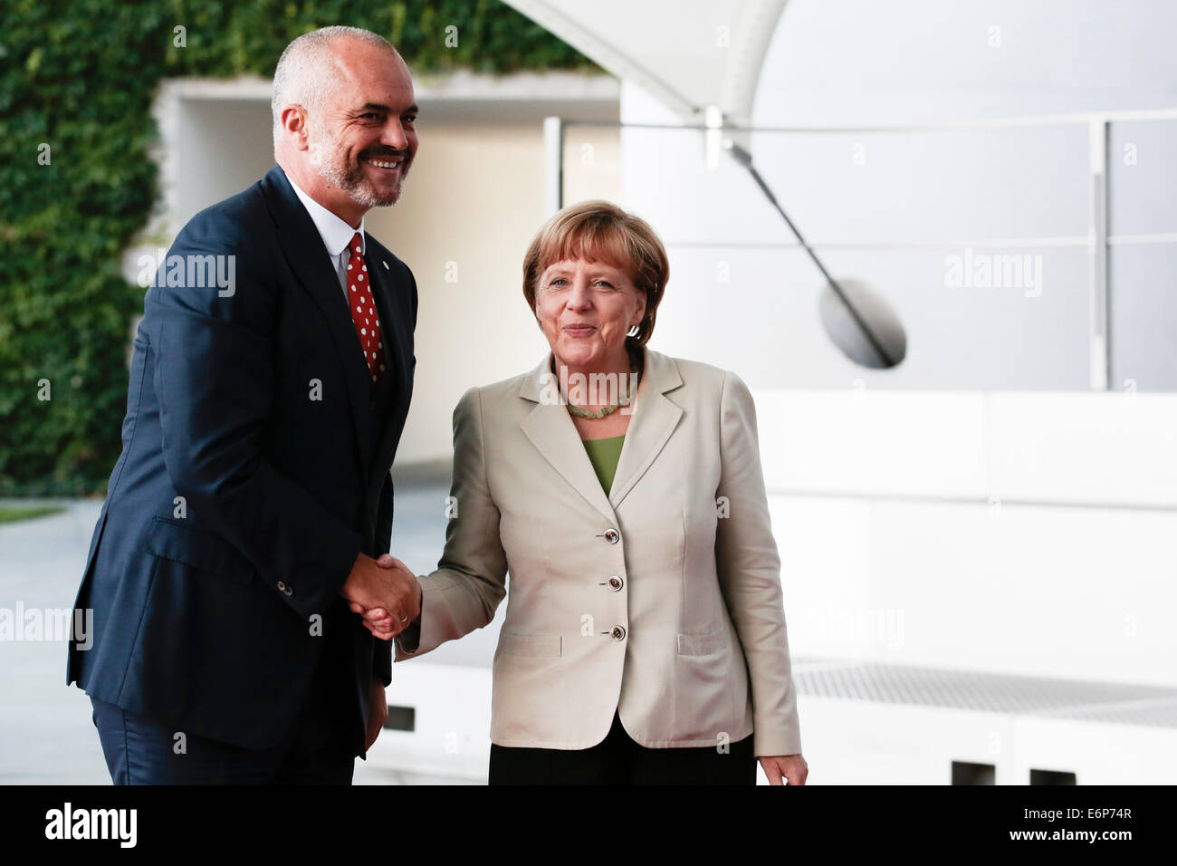 Berlin, Germany. 28th Aug, 2014. German Chancellor Angela Merkel, right, welcomes the Prime Minister of Albania Edi Rama for the 'West Balkan Conference' at the chancellery in Berlin, Thursday, Aug. 28, 2014. Merkel invited to the conference to support the economic and political situation in the South-East European region. Photo: Markus Schreiber/dpa Credit:  dpa picture alliance/Alamy Live News Stock Photo