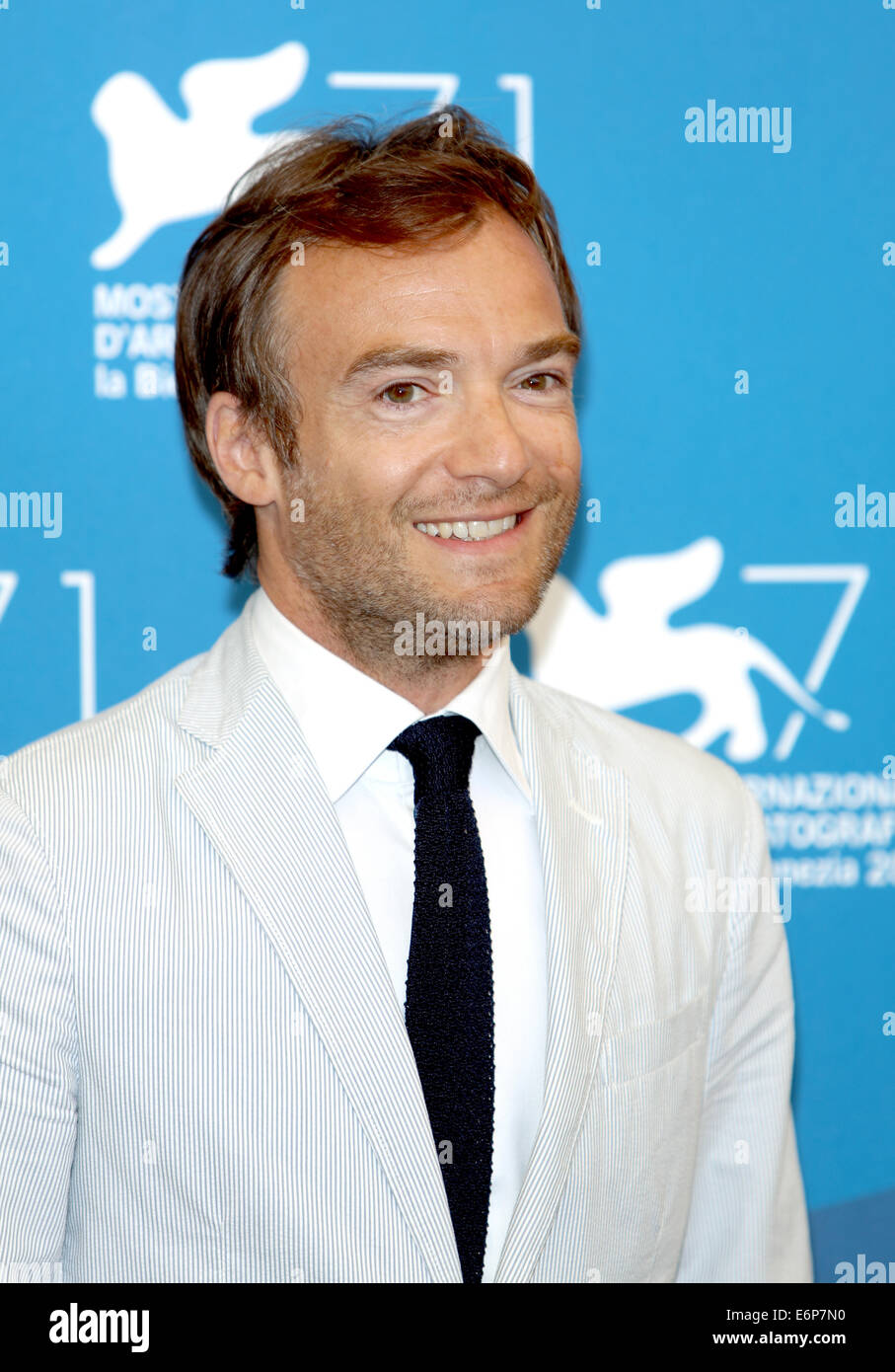 Venice, Italy. 28th Aug, 2014. French actor/cast member Jonathan Lambert poses at a photocall for 'Reality' during the 71st annual Venice International Film Festival, in Venice, Italy, 28 August 2014. The movie is presented in the Orizzonti section at the festival that runs from 27 August to 06 September. Photo: Hubert Boesl/dpa/Alamy Live News Stock Photo