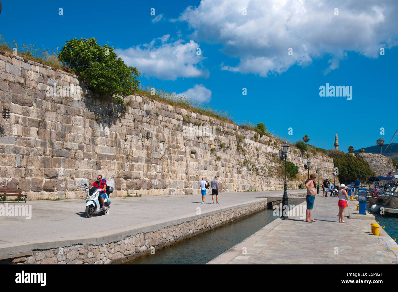 Traffic outside castle walls and the port, Kos town, Kos island, Dodecanese islands, South Aegean region, Greece, Europe Stock Photo