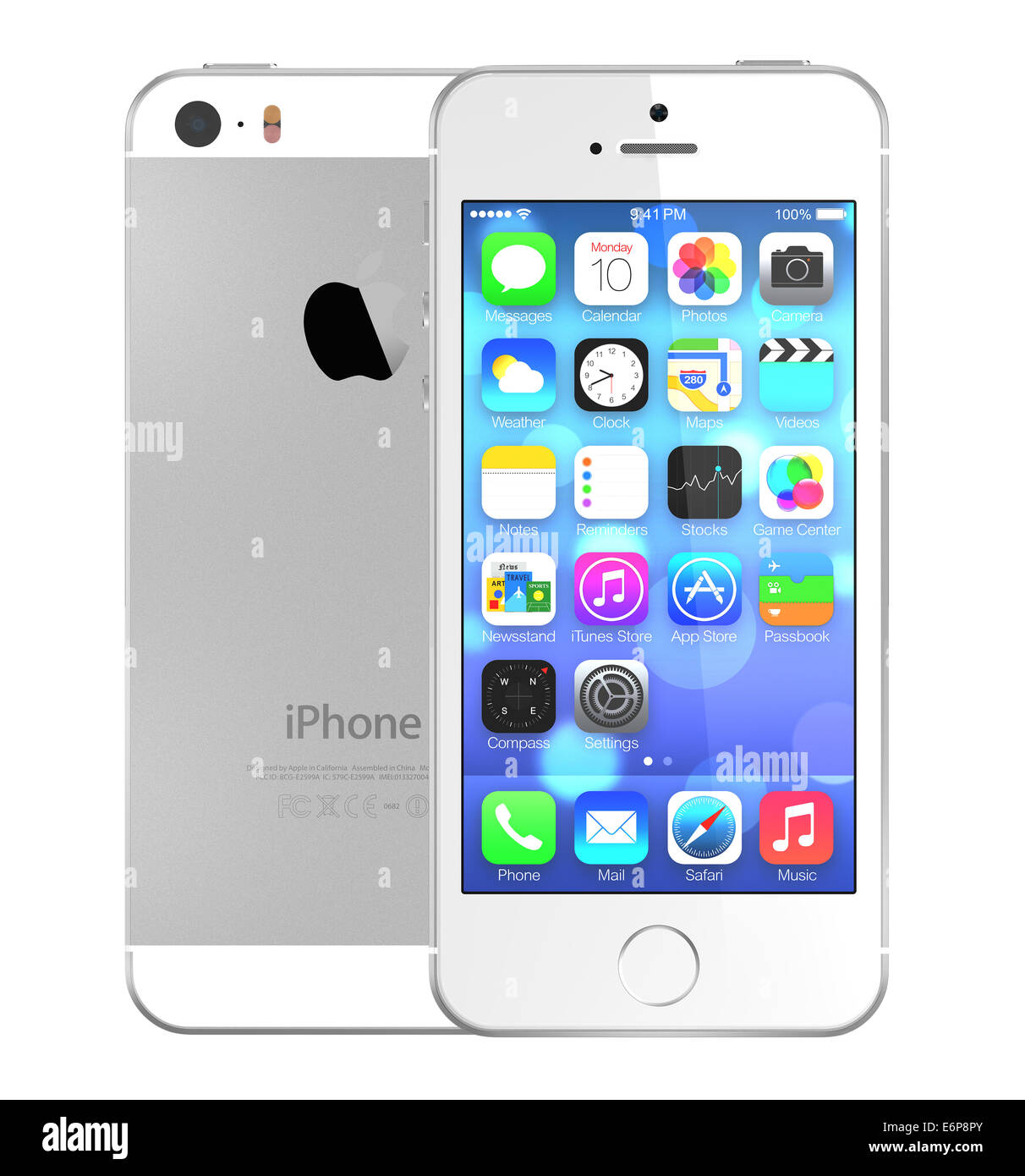 Silver iPhone 5s showing the home screen with iOS7. Stock Photo