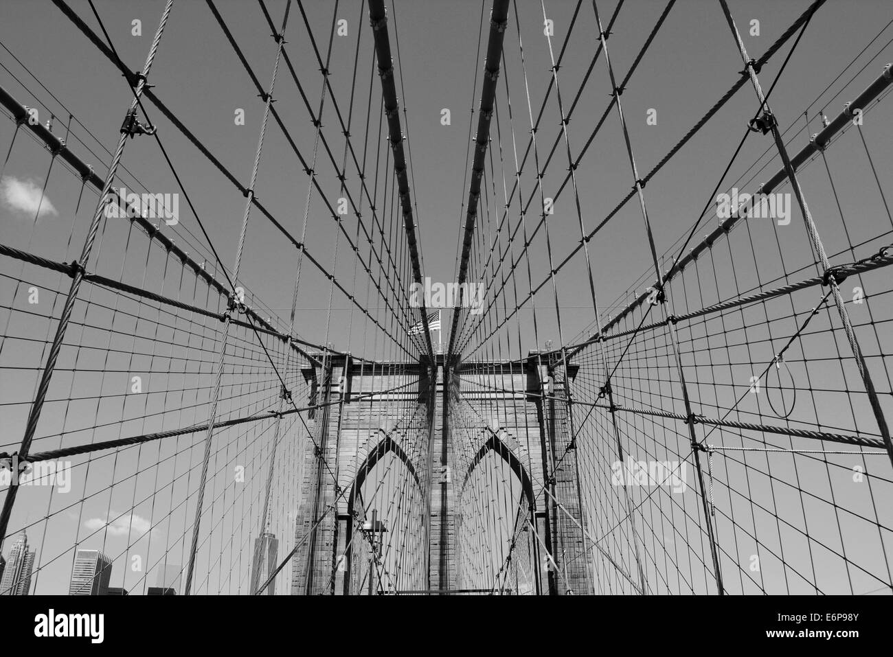 Crossing the Brooklyn Bridge. Stock Photo
