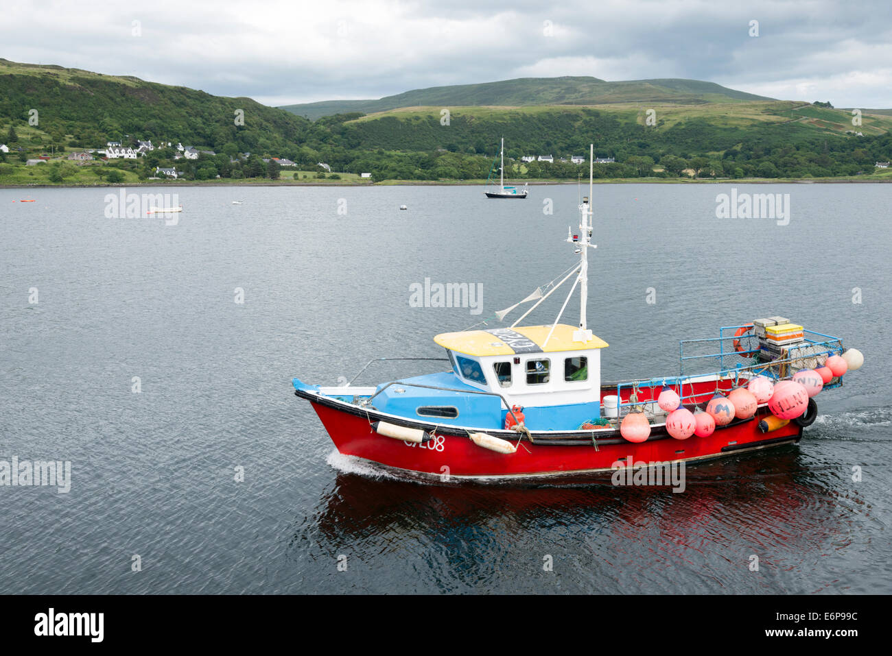 A commercial fishing boat in the bay and harbour at Uig Isle of Skye Scotland Stock Photo Alamy