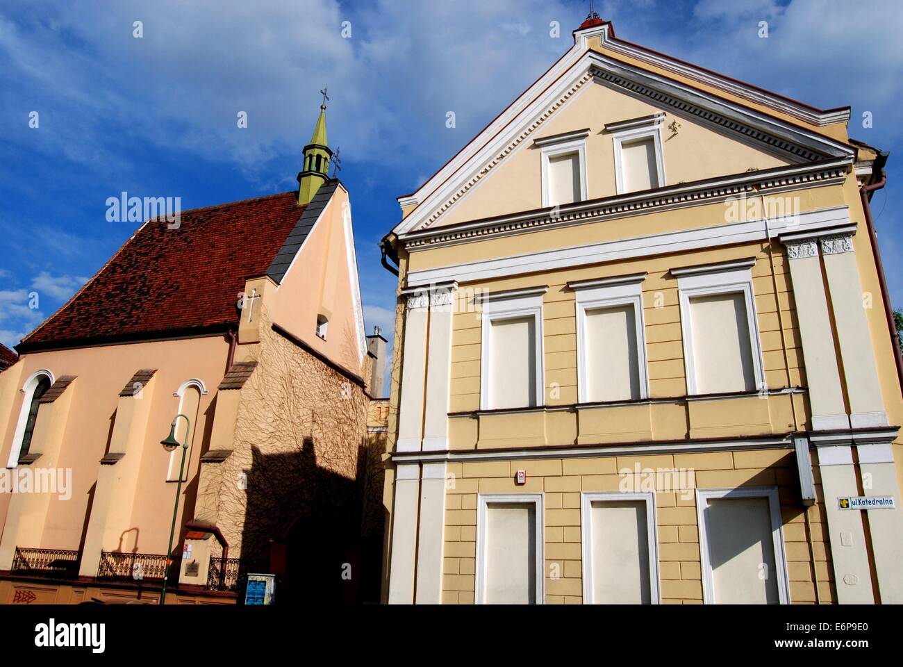OPOLE, POLAND:  Church of St. Sebastian (left) and  19th century neo-classical house Stock Photo