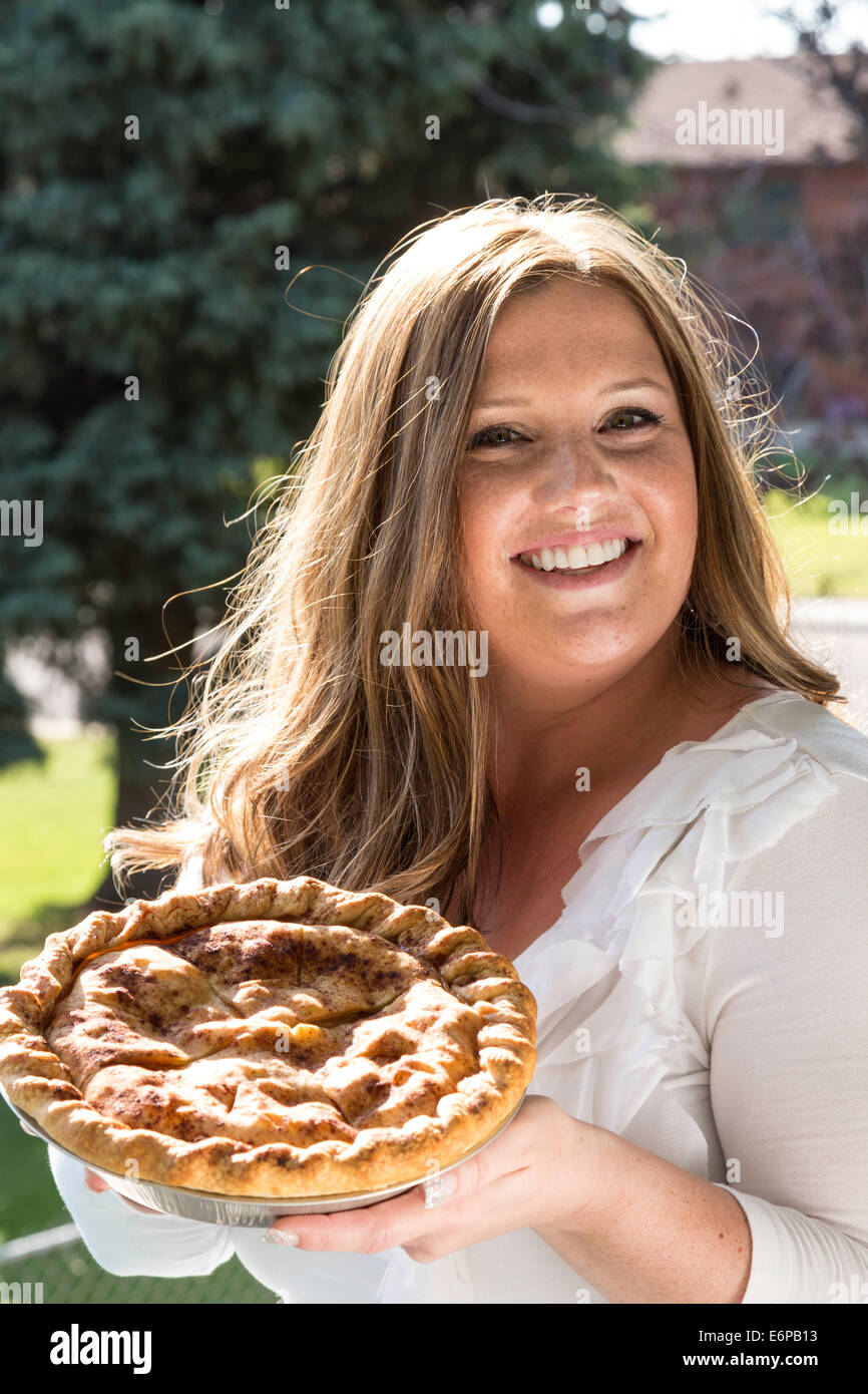 Beautiful Young Woman Showing Homemade Apple Pie, USA Stock Photo Alamy