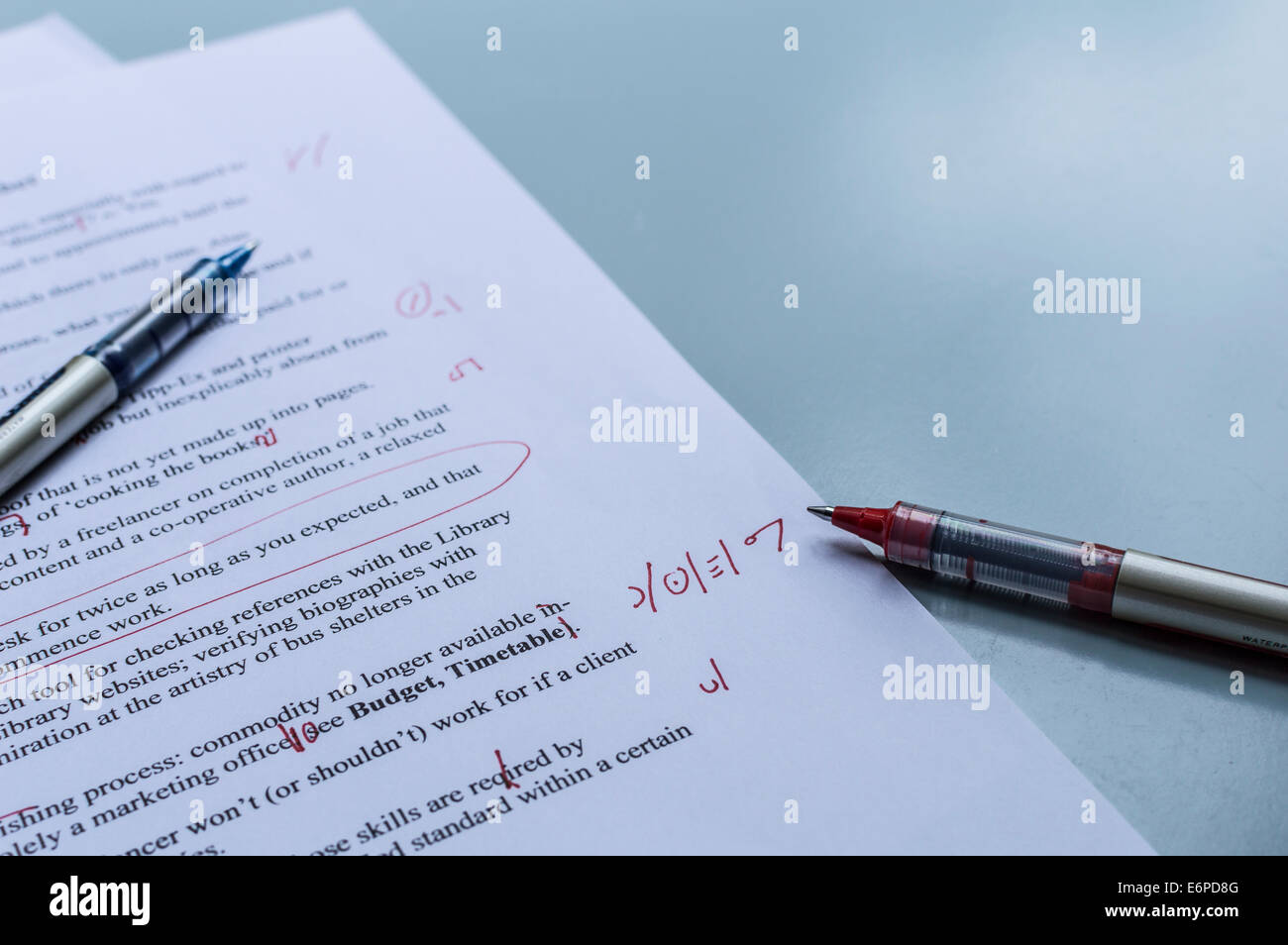 Blue And Red Pens Sit On A Manuscript Proof Page During A Break In Proofreading Stock Photo Alamy