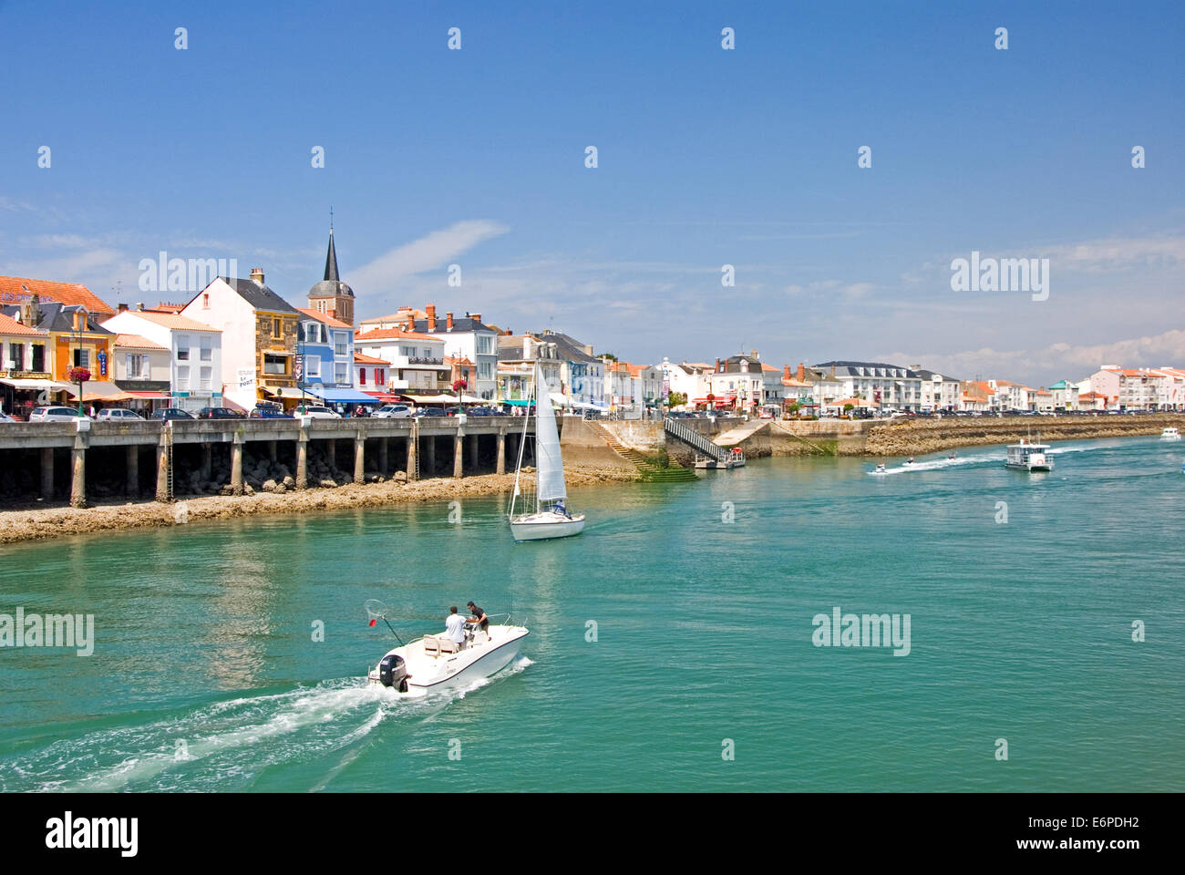 Boats entering and leaving the harbour at La Chaume / Les Sables D'Olonne, with the quayside of La Chaume. Stock Photo