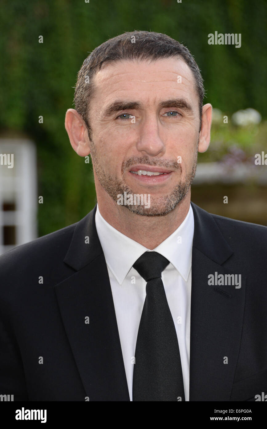 London, UK. 28th August, 2014. Martin Keown attends the Mo Farah Foundation Night Of Champions Dinner fundraising ball to celebrate champions from all walks of life, as well as raising funds for the continued development of Mo Farah Foundation projects at The Hurlingham Club in London. Credit:  See Li/Alamy Live News Stock Photo