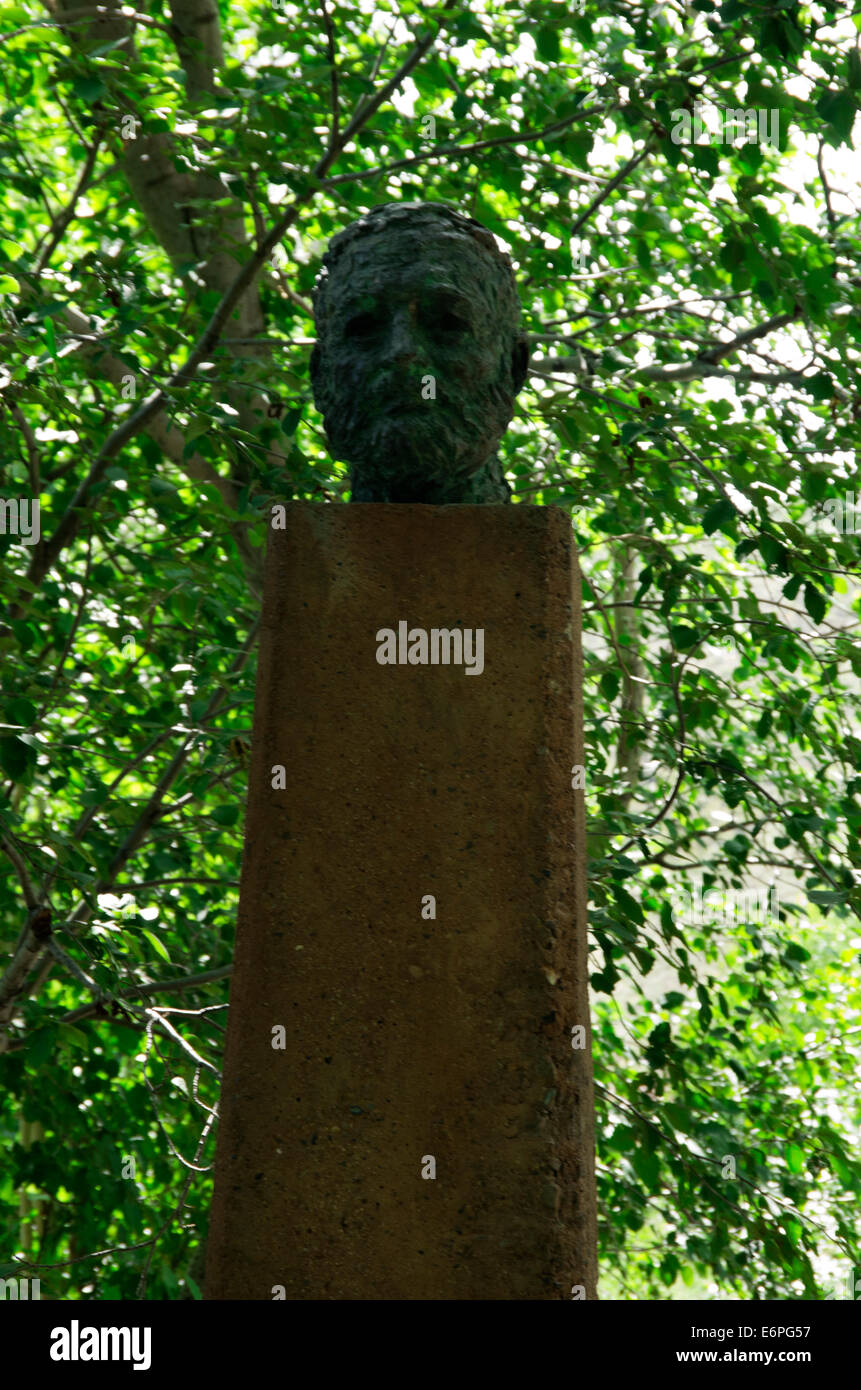 Ernest Hemingway statue top in trees on hill, front view Stock Photo