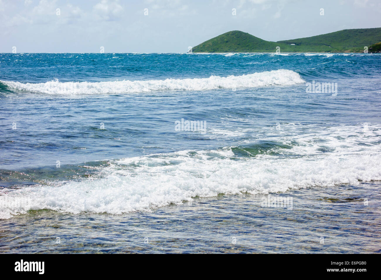 A view of the Caribbean sea from the east end of St. Croix, U. S. Virgin Islands. Mount Eagle is seen in the distance. USVI, U.S.V.I. Stock Photo