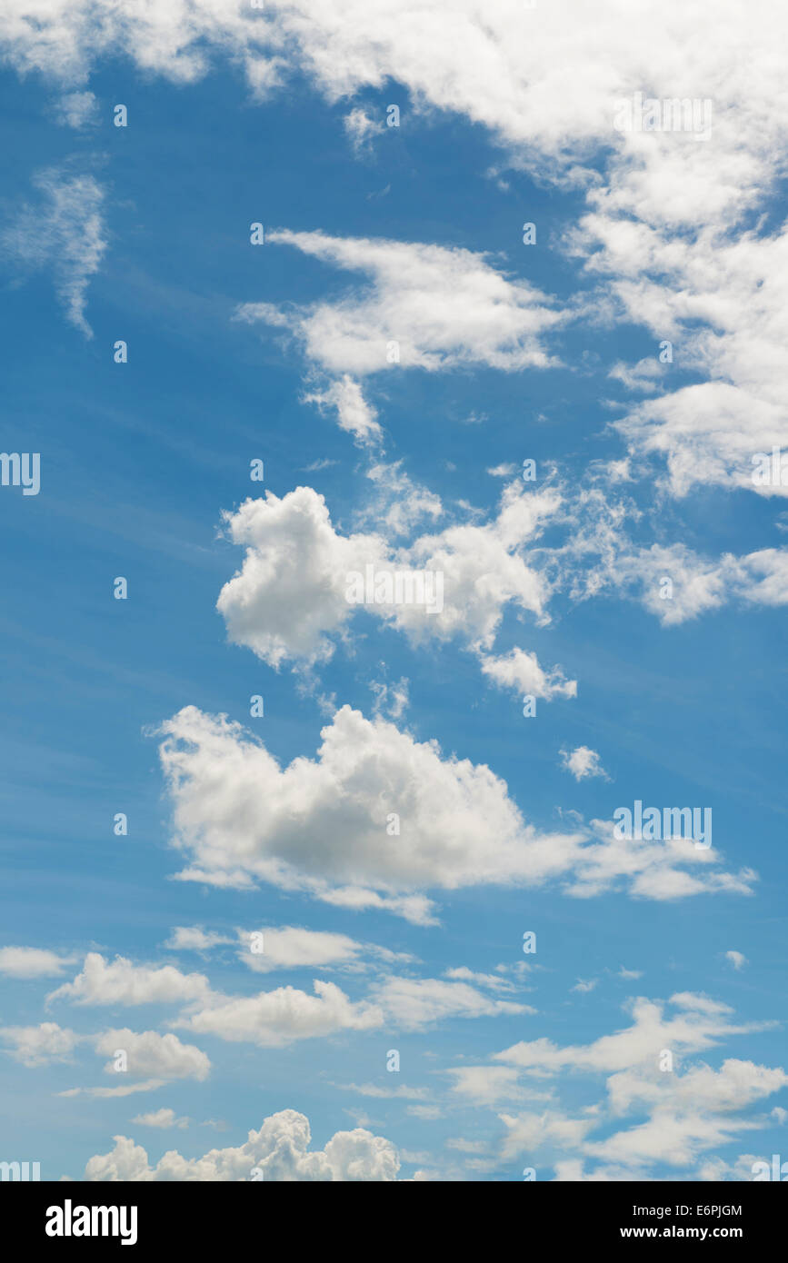 The blue sky and white fluffy clouds Stock Photo - Alamy