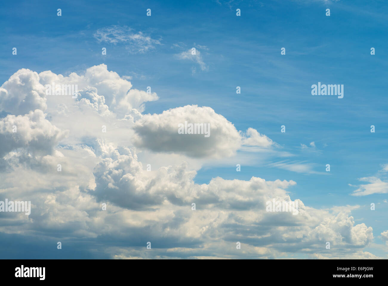 The blue sky and white fluffy clouds Stock Photo - Alamy
