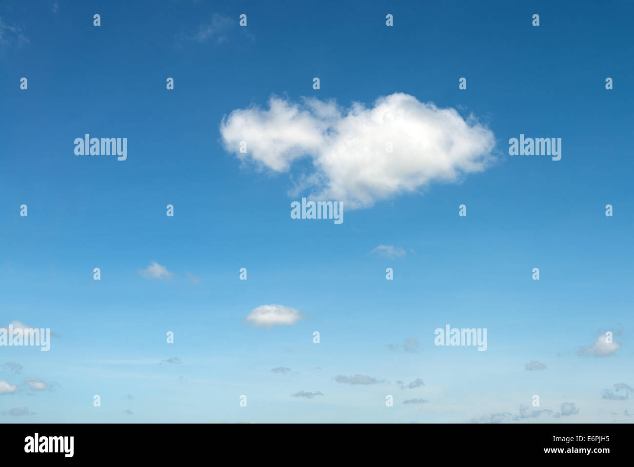 The blue sky and white fluffy clouds Stock Photo - Alamy