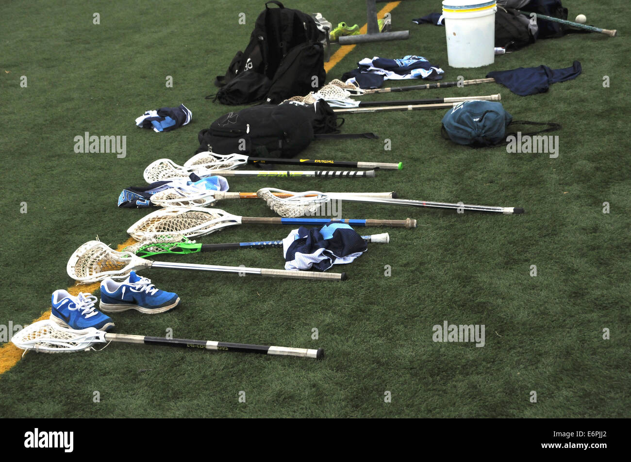 Lacrosse raquets, shoes and backpacks Stock Photo