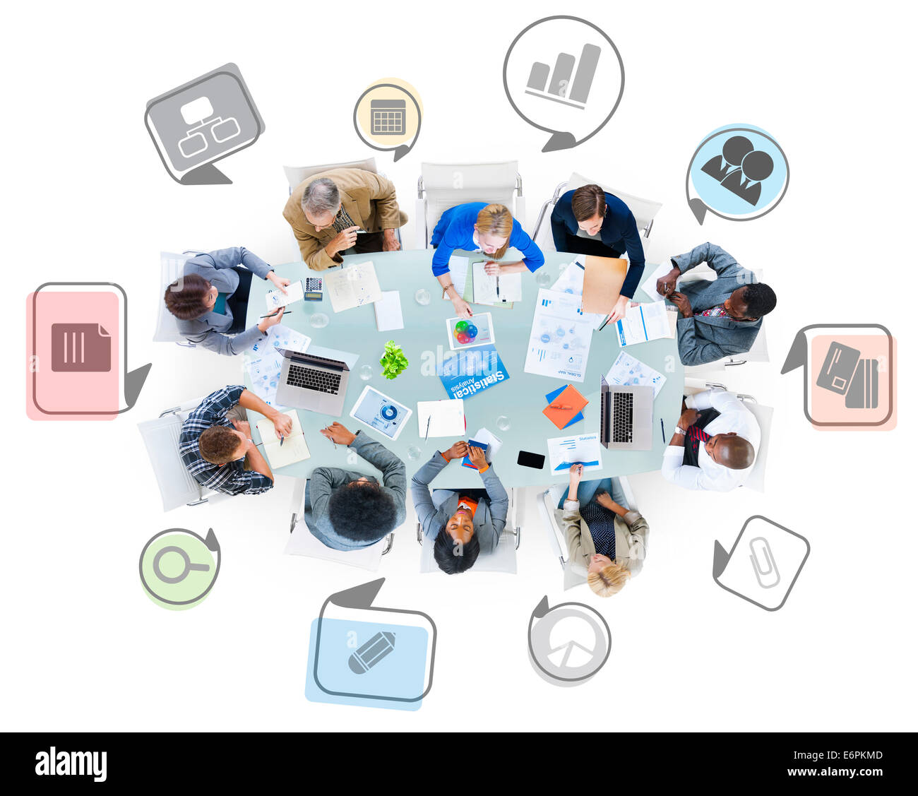 Group of Business People in a Meeting with Business Symbols Stock Photo