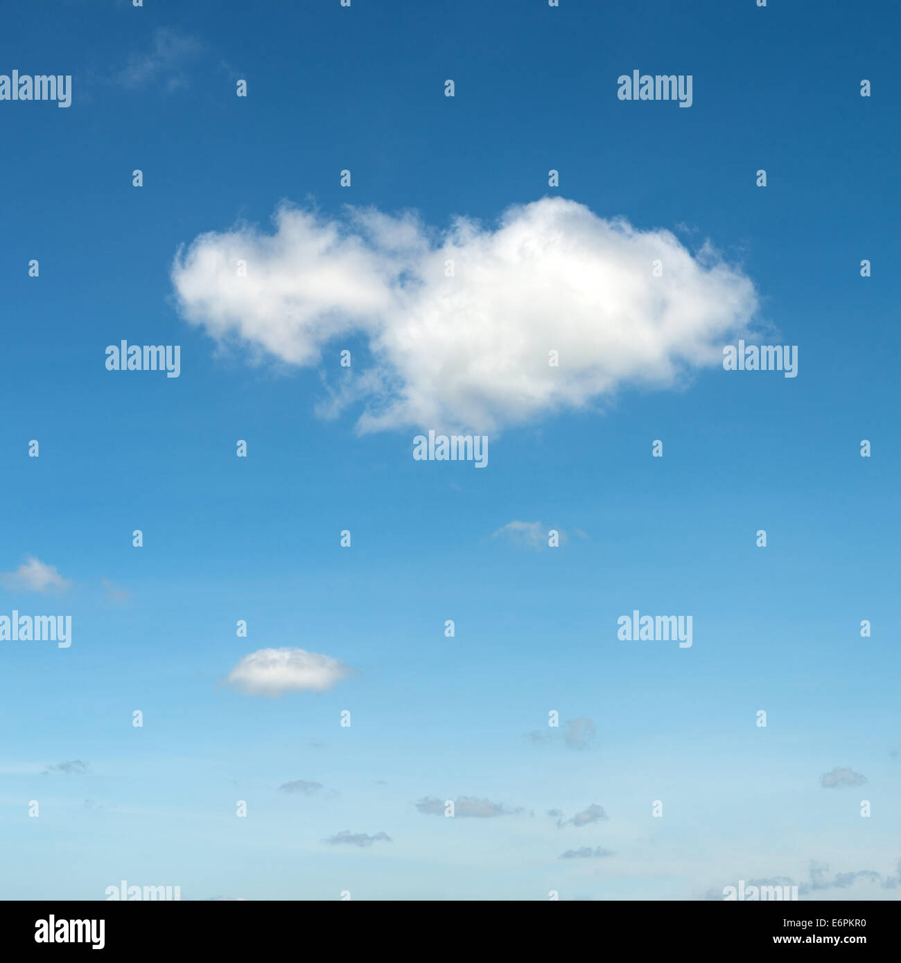 The blue sky and white fluffy clouds Stock Photo - Alamy