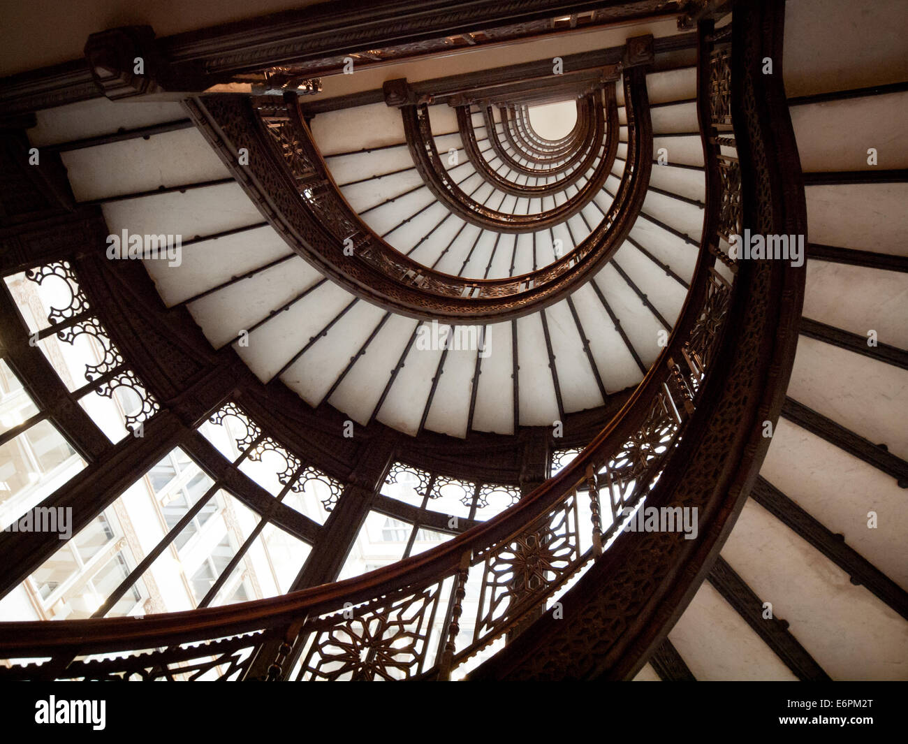The brilliant oriel staircase at The Rookery, one of the most historically significant buildings in Chicago. Stock Photo