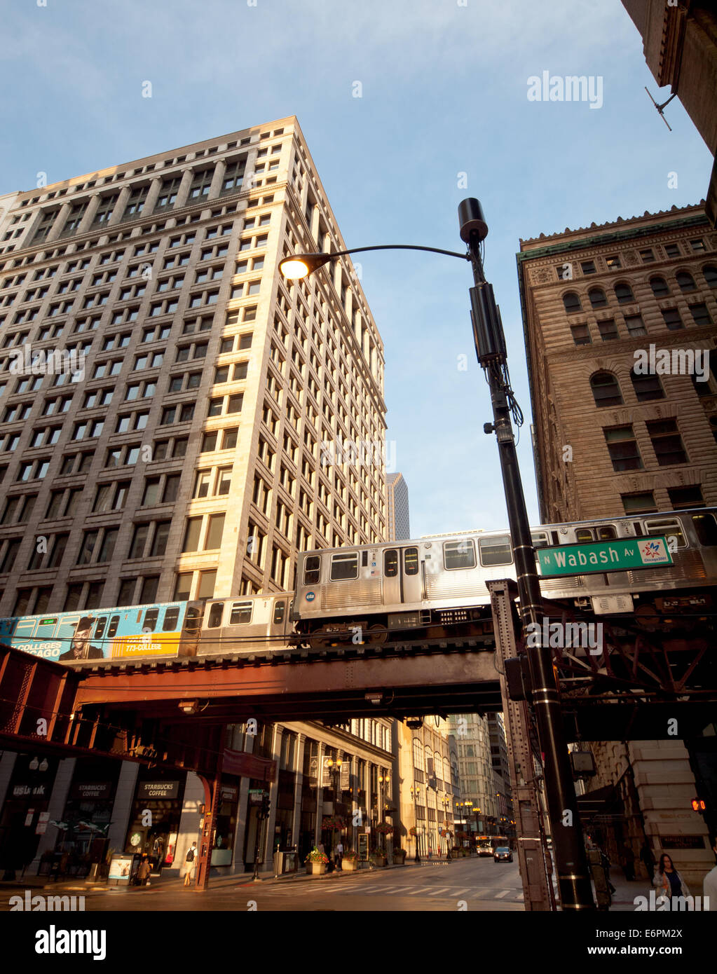 A view of Chicago 'L' train on an elevated track above Wabash Avenue in the Loop District of downtown Chicago. Stock Photo