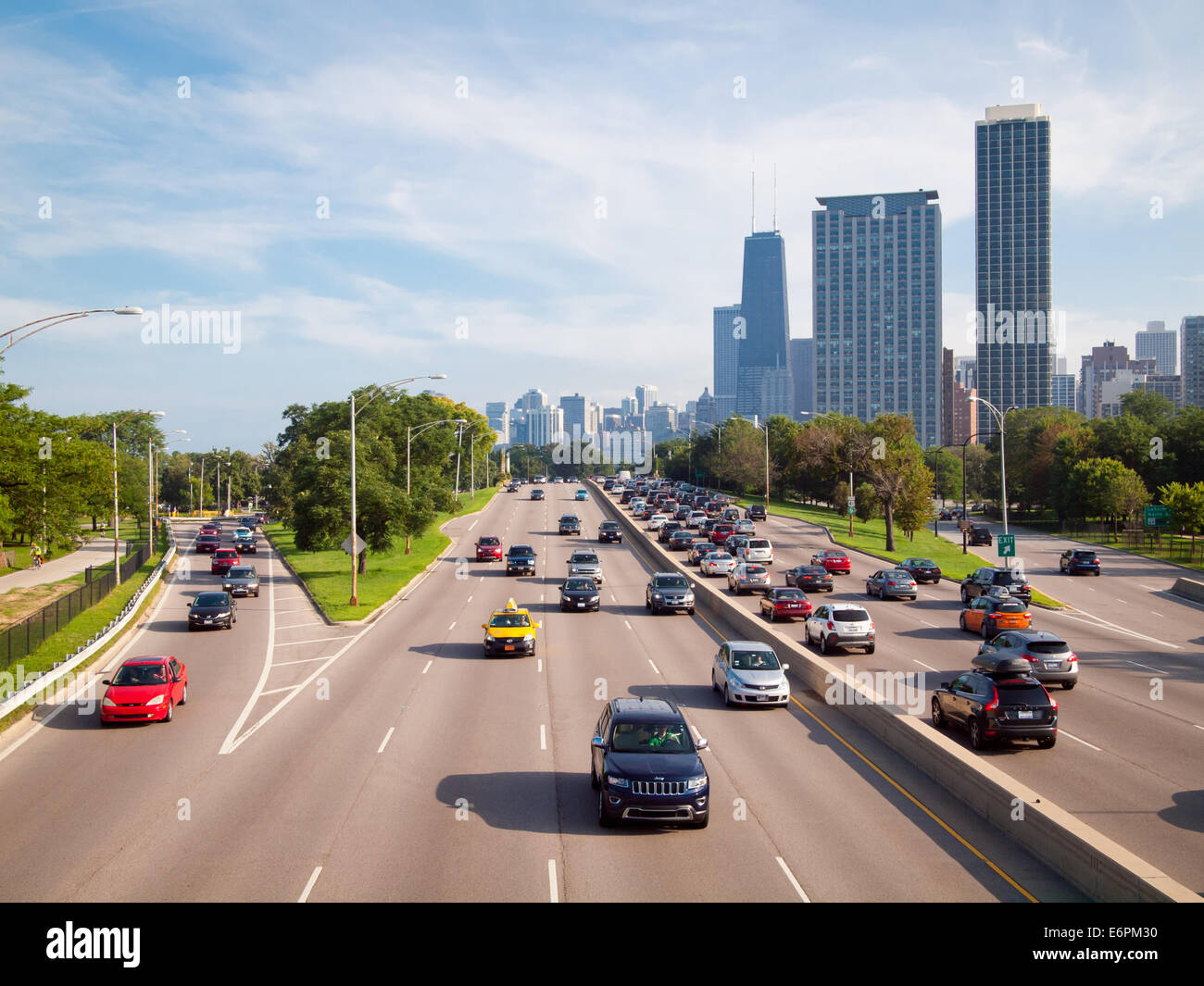 A view of the car traffic on North Lake Shore Drive and the Chicago skyline, including the John Hancock Center.  Chicago. Stock Photo