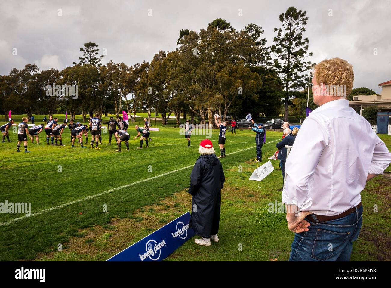 Sydney, Australia. 29th August, 2014. 2014 Bingham Cup President and Sydney Convicts founder Andrew “Fuzz” Purchas looks on as Sydney Convicts go in for a try on the first day of World Cup of Gay Rugby the Bingham Cup. Credit:  MediaServicesAP/Alamy Live News Stock Photo