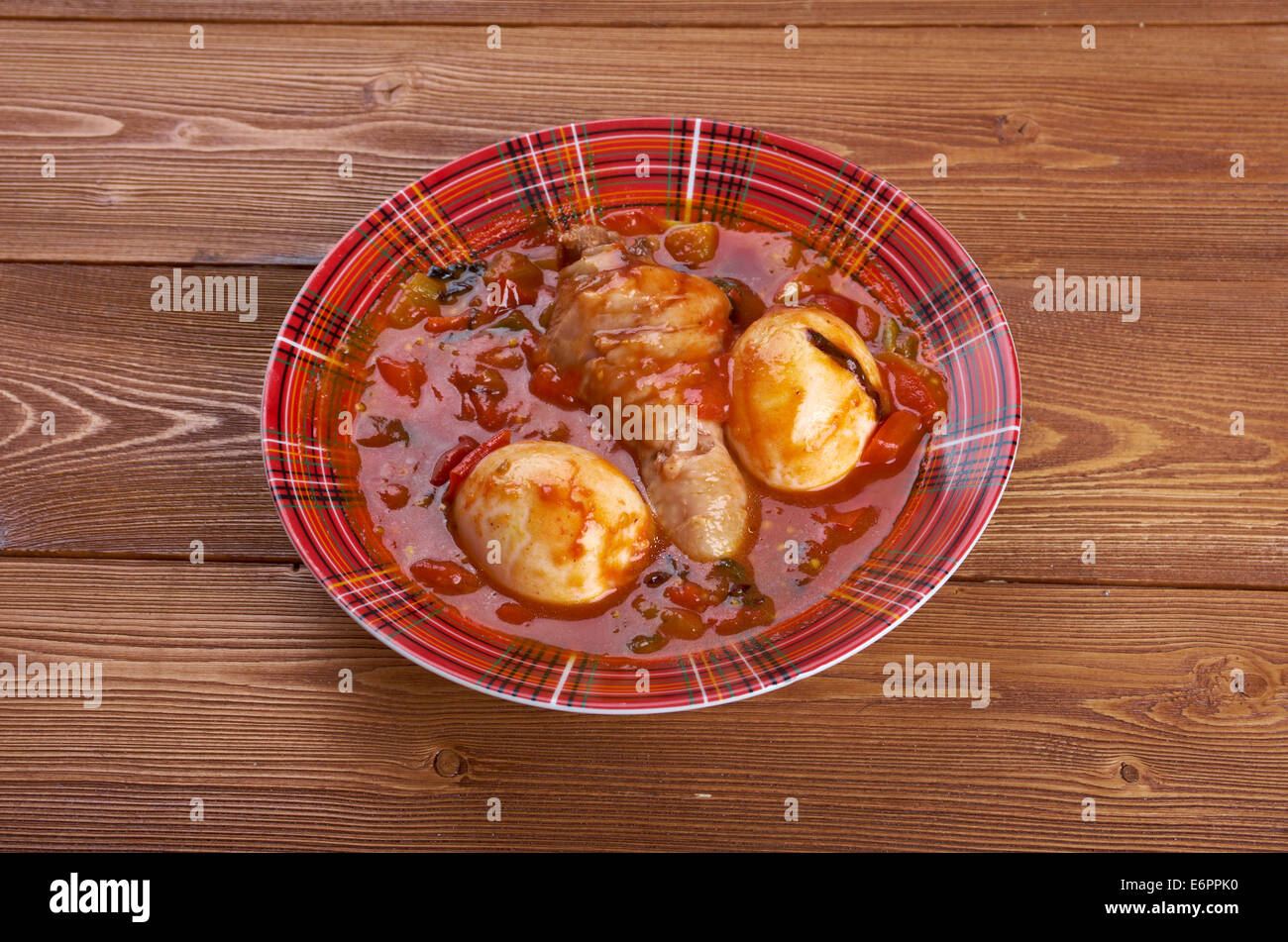 Doro Wat - Ethiopian red chicken stew wat is one such stew, made from chicken and sometimes hard-boiled eggs. Stock Photo
