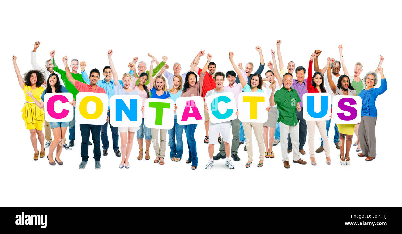 Multiethnic group of arms outstretched people holding cardboards forming contact us. Stock Photo