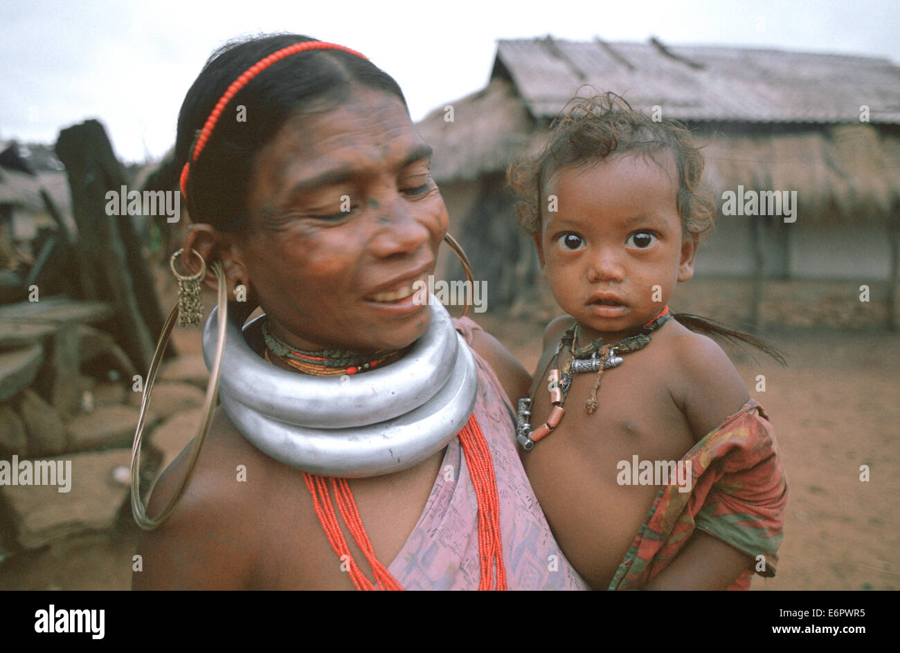 Mother and son belonging to the Gadaba tribe ( India). The photo has been taken during the monsoon. Stock Photo