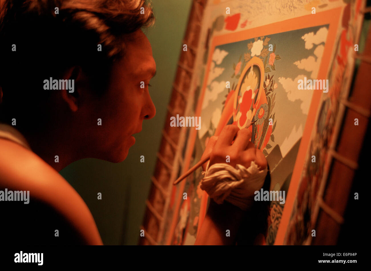 Newar artist painting a 'paubha', a traditional religious painting made by the Newar people ( Nepal) Stock Photo