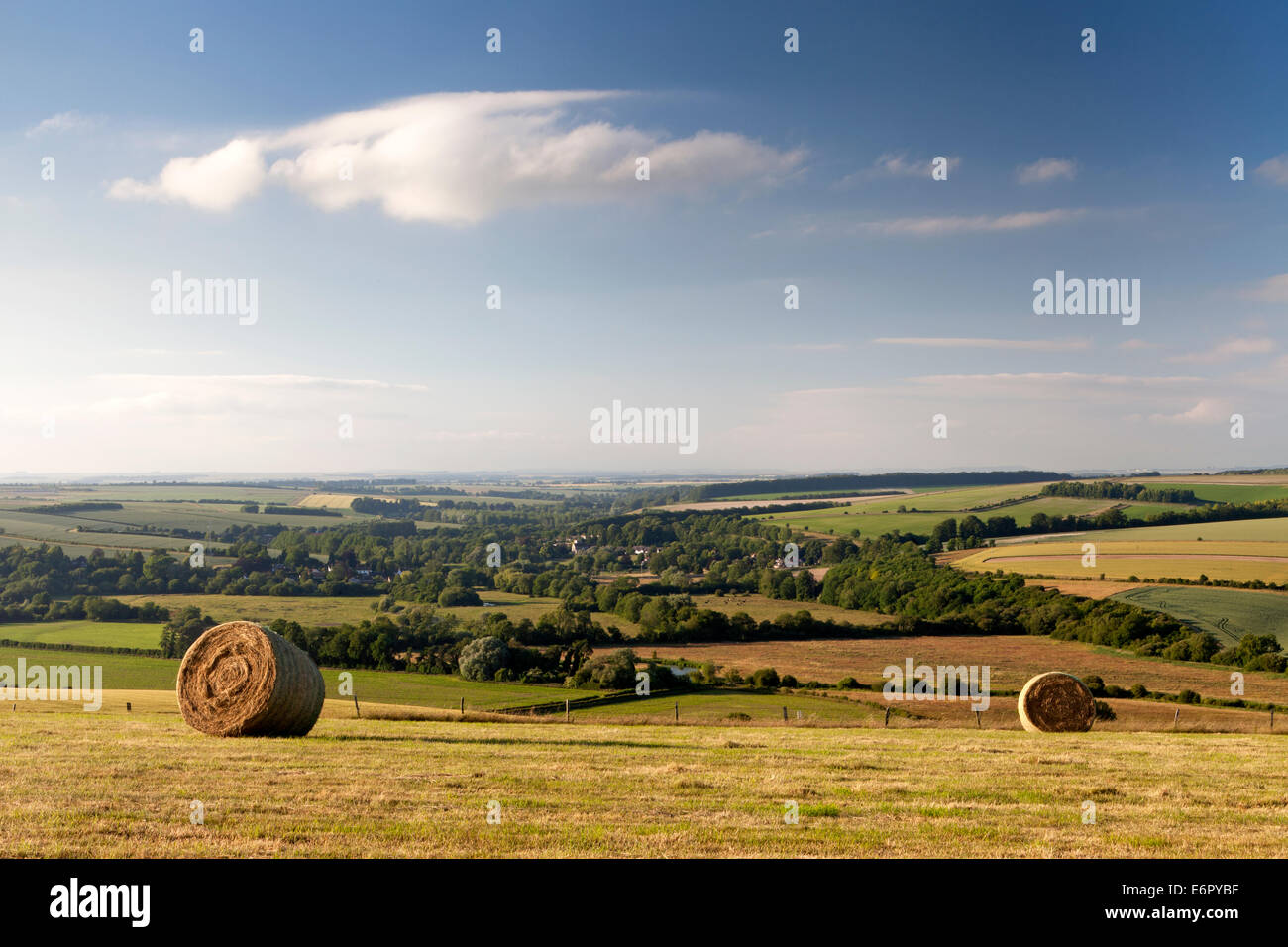 Hay bales on Ebsbury Hill near Great Wishford in Wiltshire, England. Stock Photo