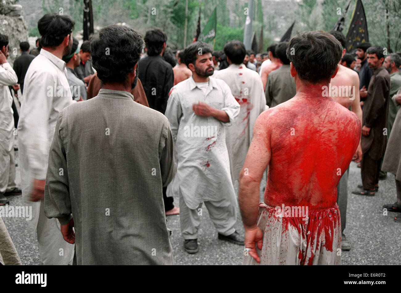 Shiite men commemorating the muslim festival of Ashura ( Pakistan) Stock Photo
