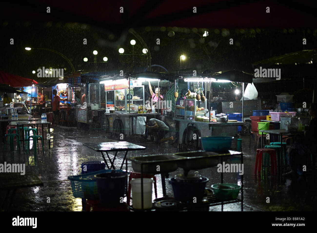 Thailand, Krabi - Rain storm at night food markets Stock Photo