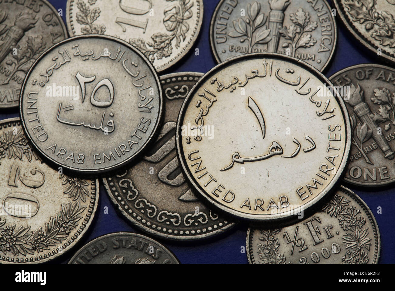 Coins of the United Arab Emirates. UAE one dirham and twenty five fils coins. Stock Photo