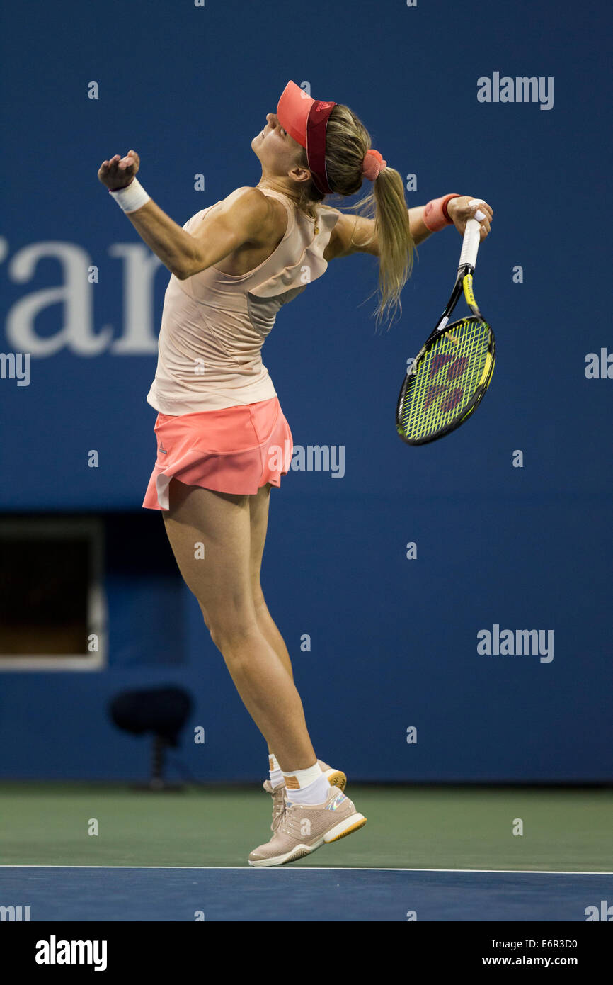 Flushing Meadows, NY, USA. 25th Aug, 2014. Maria Kirilenko (RUS) in action against Maria Sharapova (RUS)   during Day 1 of the U Stock Photo