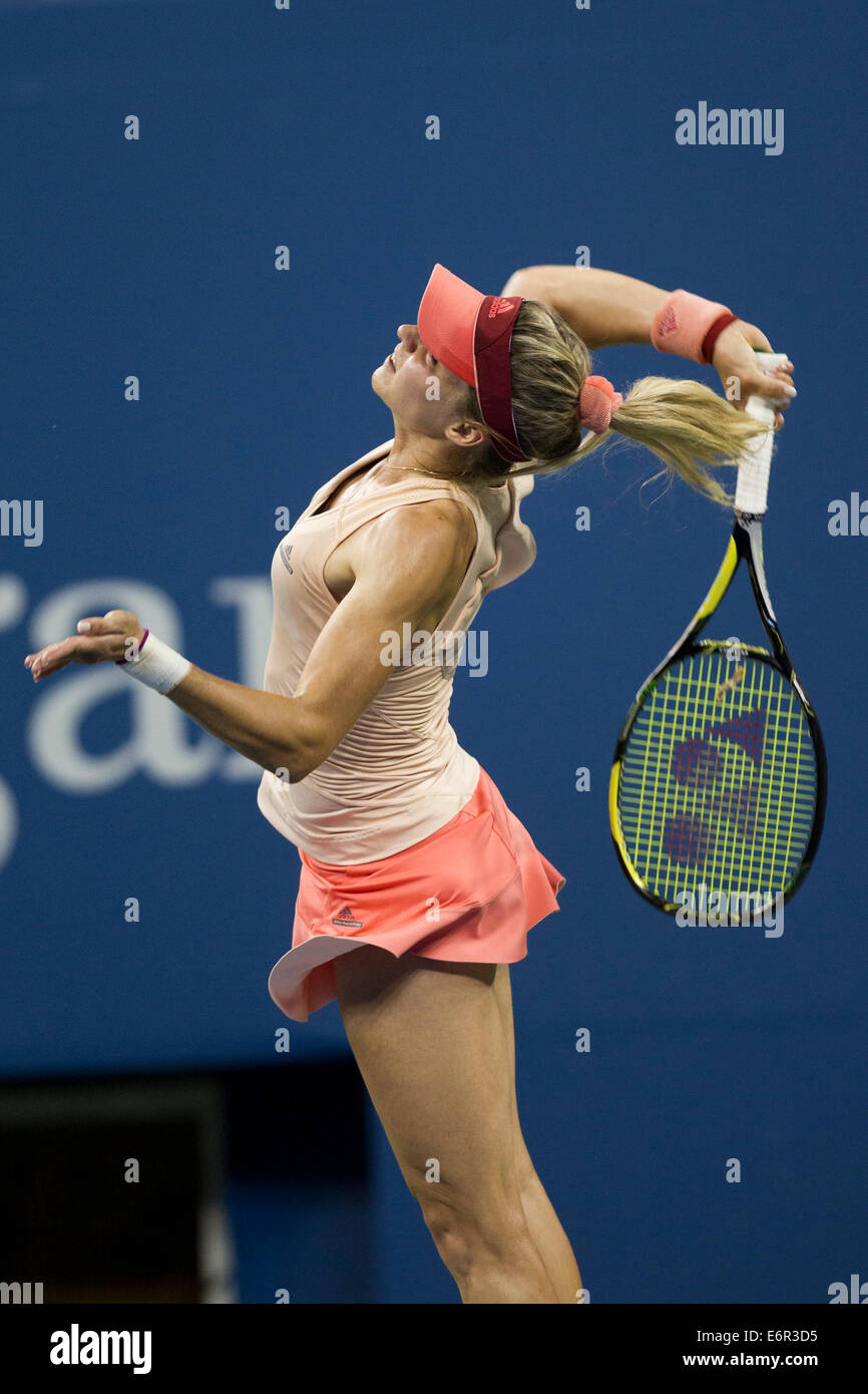 Flushing Meadows, NY, USA. 25th Aug, 2014. Maria Kirilenko (RUS) in action against Maria Sharapova (RUS)   during Day 1 of the U Stock Photo