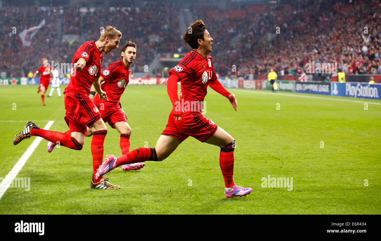 Leverkusen, Germany, 1st October, 2014. UEFA Champions League 2014/2015  Group stage Group C matchday 2, Bayer 04 Leverkusen (red) - Benfica  Lissabon (black) --- Heung-Min Son (Leverkusen) and Stefan Kie§ling  (Kiessling) (Leverkusen)