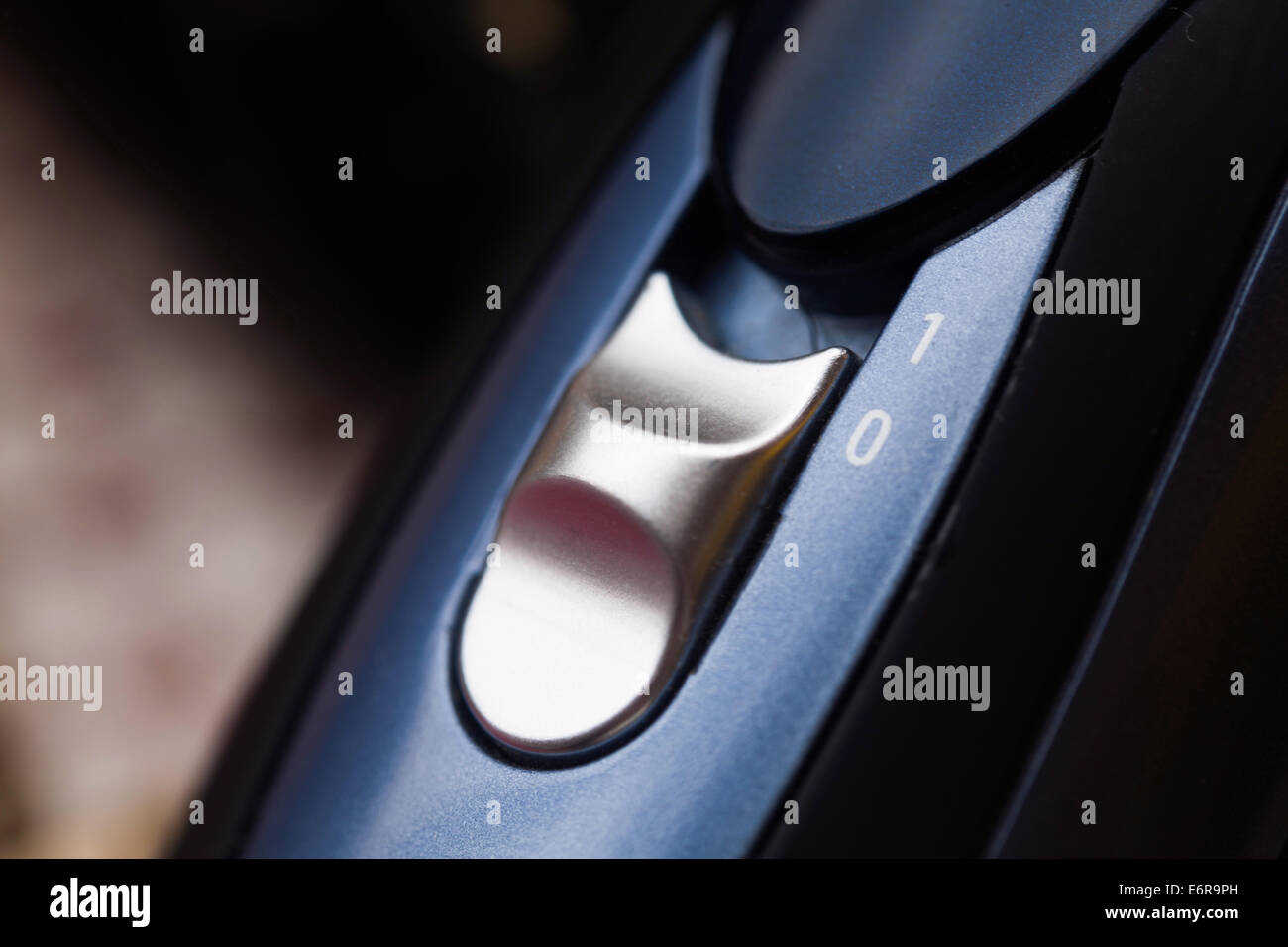 Blue ON/OFF or power switch. Close up, selective focus over 1 Stock ...