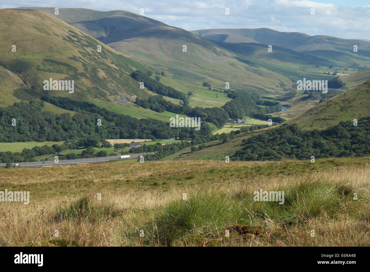 The Howgill Fells and M6 motorway through Lune Gorge, between Lake District National Park and Yorkshire Dales National Park Stock Photo