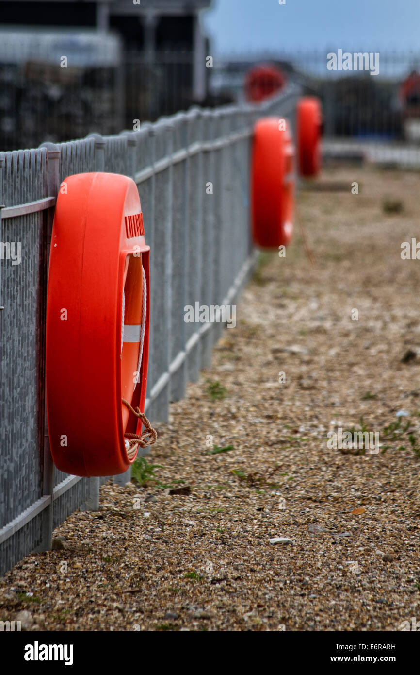 Lifebuoy or water rescue rings fixed to railings, Southwold harbour