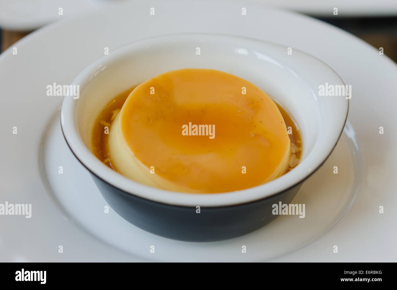 Creme caramel , Custard pudding flan in a bowl Stock Photo Alamy