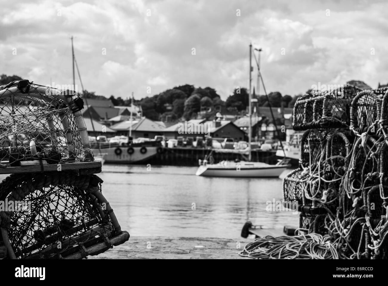 Yacht sailing out of Whitby harbour Stock Photo - Alamy