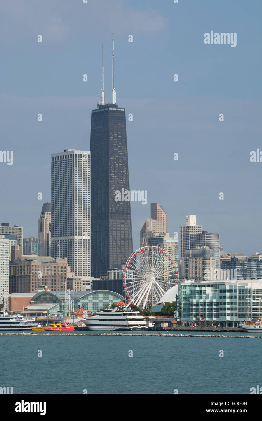 Illinois, Lake Michigan, Chicago. Navy Pier with Chicago city skyline in distance, including the John Hancock. Stock Photo