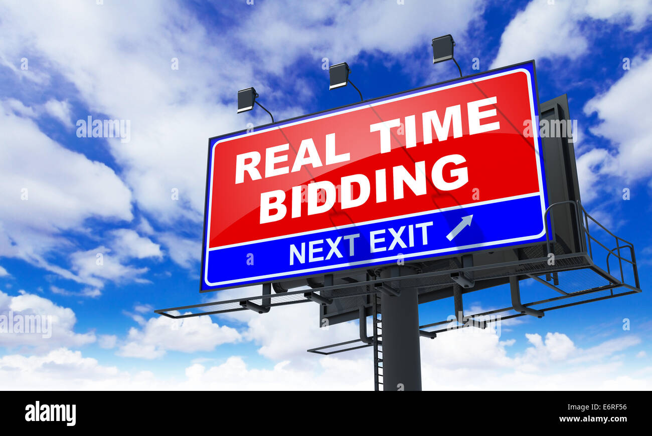 Real Time Bidding on Red Billboard. Stock Photo