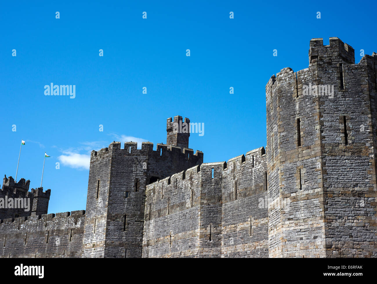 The walls of Caernarfon Castle in North Wales Stock Photo