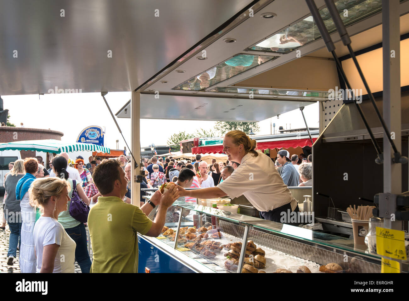 Hamburg, Germany July 20, 2014 A fishmonger is selling a fish