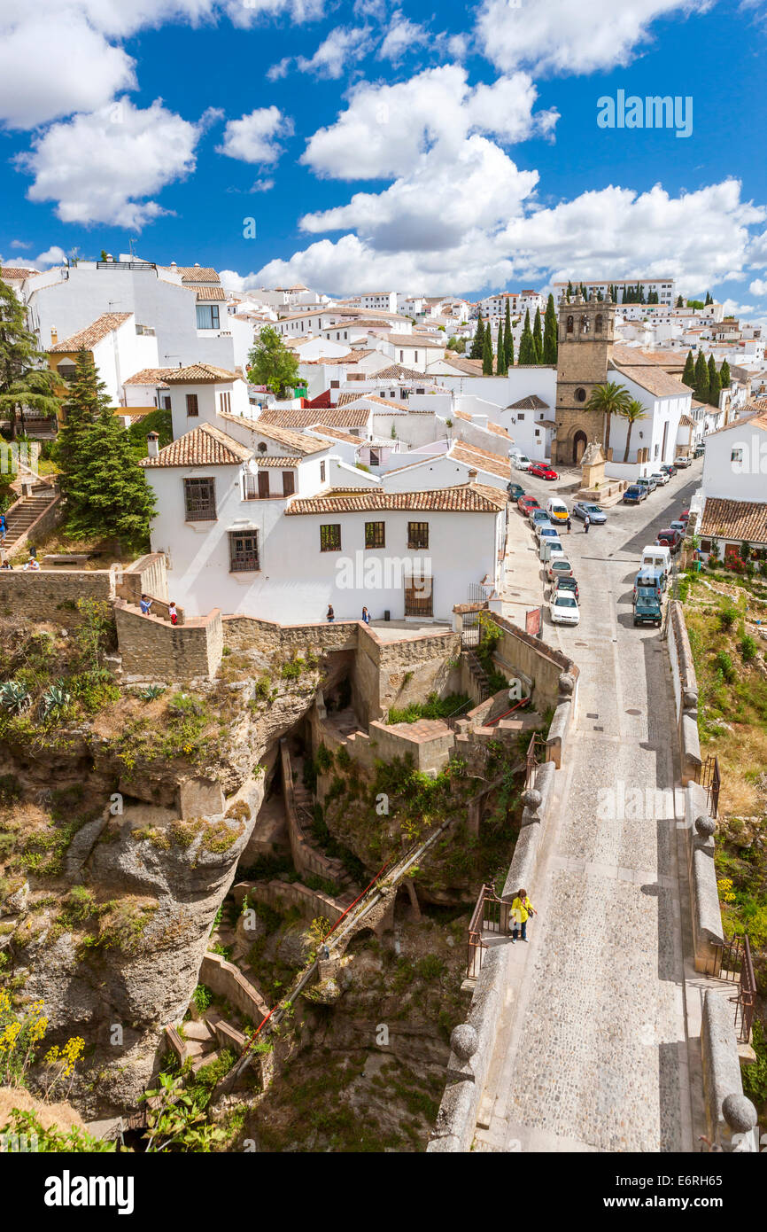 Iglesia de Padre Jesusand and Puente Viejo (Old Bridge) over Guadalevín River, Ronda, Malaga province, Andalusia, Spain, Europe. Stock Photo